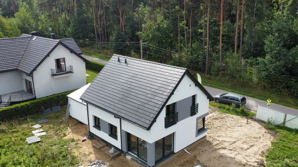 Casa con desván utilizable, tejado a dos aguas y garaje de menos de 110 m2